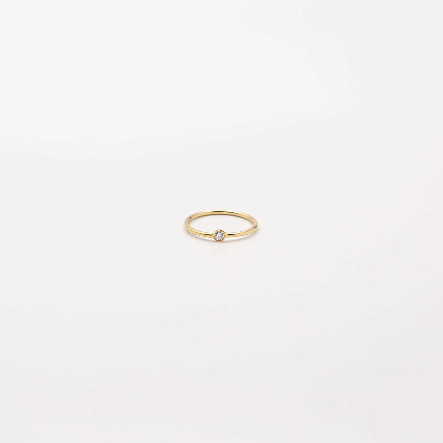 Tiny Round Diamond Ring