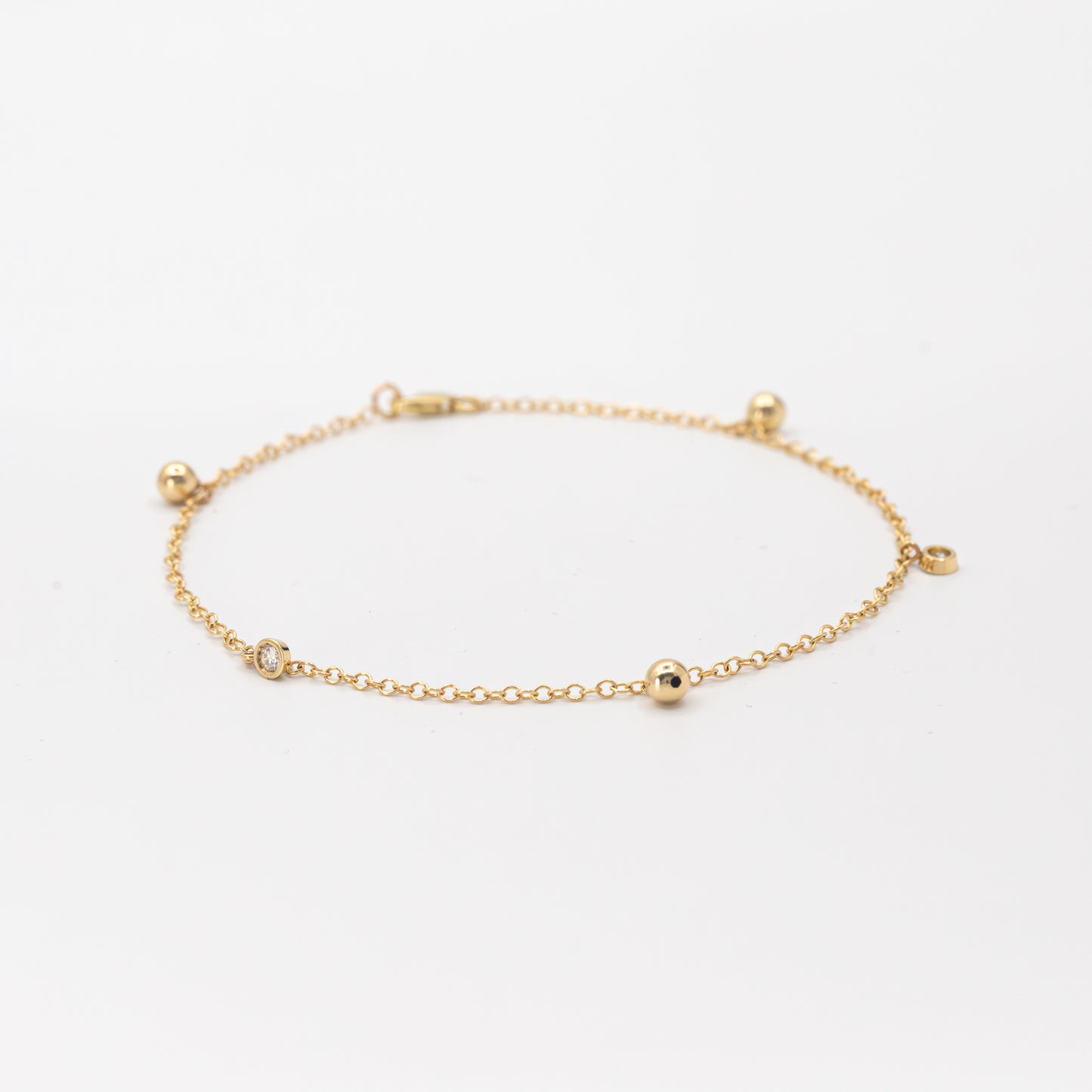 Diamond and Gold Ball Dangle Bracelet